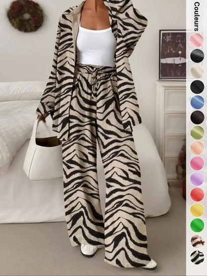 Ensemble deux pièces pour femme : chemise décontractée et sportive avec pantalon long à jambes larges, haut boutonné ample ; confortable et élégant.